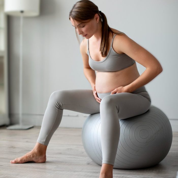 pregnant-woman-exercising-home